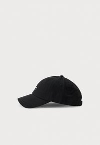 Black cotton baseball cap with a curved brim, adjustable strap at the back, and embroidered logo detail on the front.