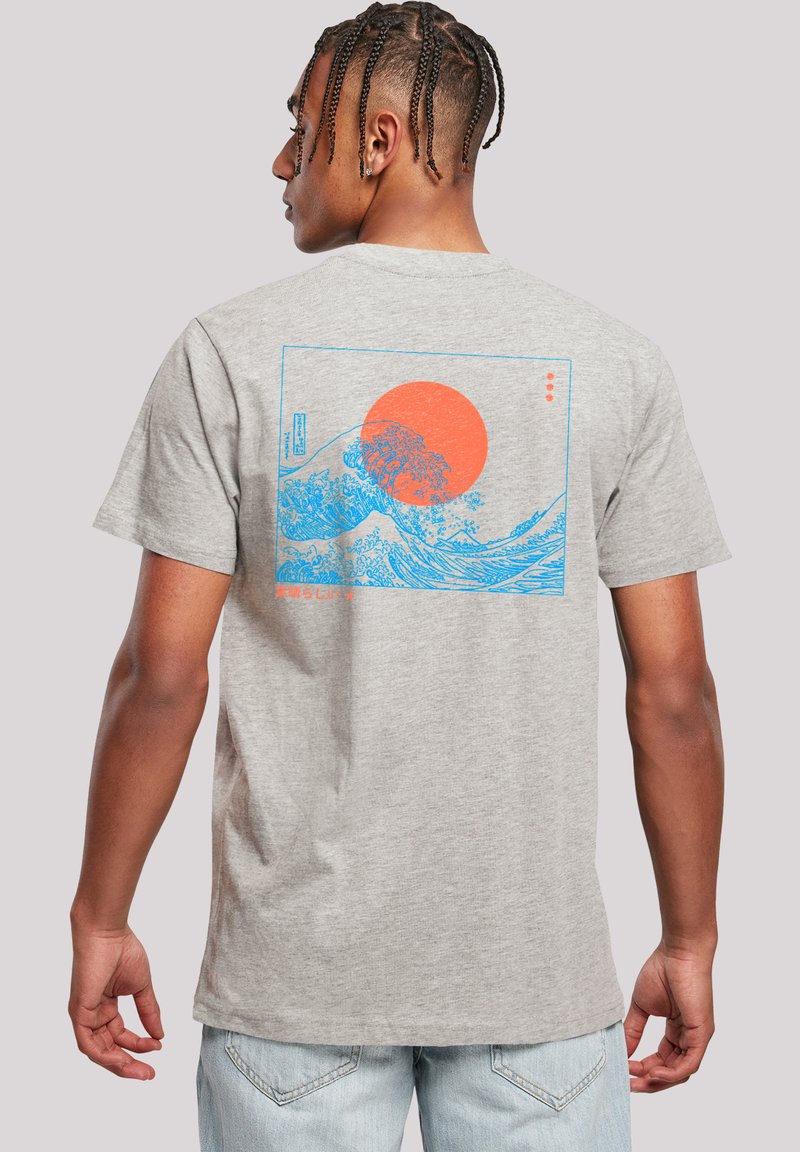 Gray cotton t-shirt featuring a blue and orange graphic of waves and a sun on the back. Short sleeves, relaxed fit, crew neck design.