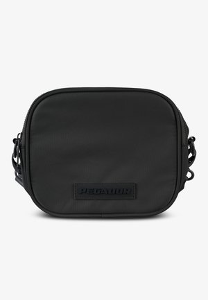 Black square crossbody bag in durable nylon fabric, featuring a smooth texture and a prominent rubber logo patch on the front.