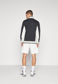 Fila SHORTS SANTANA - Spordišortsid - white alyssum