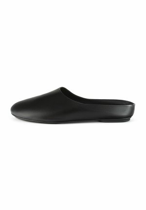 Black slip-on shoe with a smooth leather finish, round toe, minimalist design, and backless style, featuring a low, flat sole.
