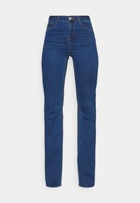 Högmidjade, raka jeans i mörkblå denim. Har minimala sömdetaljer och fem fickor med en klassisk knappstängning.