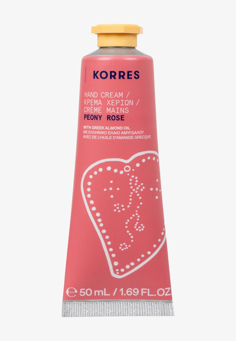 Peonirose handkräm i en 50 ml metalltub har en rosa etikett med vita detaljer och text, med en dekorativ hjärtformad design.