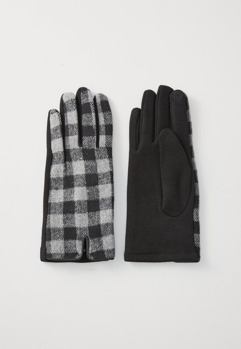 Ζεύγος γαντιών με μαύρο και γκρι καρό σχέδιο από τη μία πλευρά και κενό μαύρο ύφασμα από την άλλη, ακουμπισμένα επίπεδα σε λευκό φόντο.