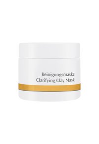 White cylindrical jar with a gold accent stripe and gray line. Label reads "Reinigungsmaske Clarifying Clay Mask" in black text.
