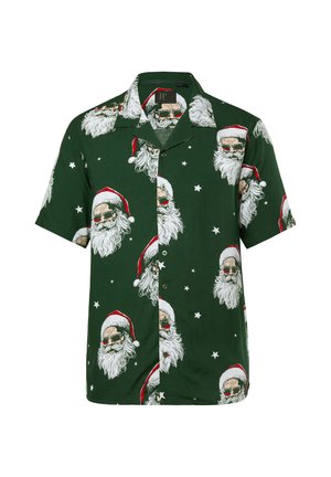 Korte mouw groene shirt met herhaalde prints van de kerstman met een baard, die zonnebrillen en een rode hoed draagt, omlijst door witte sterren.