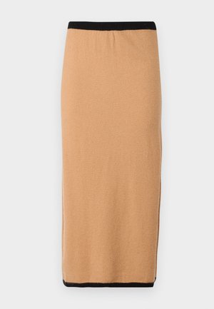 Hame midi berwarna camel, terbuat dari rajutan, dengan pinggang elastis hitam dan tekstur yang halus. Desain sederhana, tanpa pola atau aksen yang terlihat.