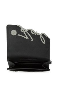 Black leather wallet with a scalloped top edge, featuring a silver metal signature accent and a press-stud closure. Interior has card slots.