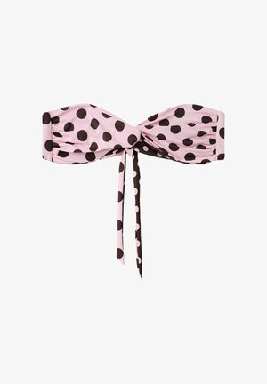 Pinkes Bandeau-Bikinitop mit großen schwarzen Polka-Dots und einem vorderen Knotenband, das abwechselnd pinken und schwarzen Stoff mit Punkten zeigt.