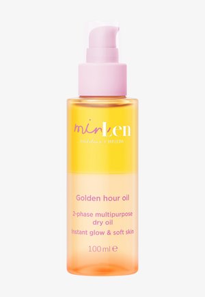 Gennemsigtig flaske med gul og orange 2-faset olie mærket "Golden hour oil," pink pumpe, 100 ml multifunktionel tør olie til hudens glød.