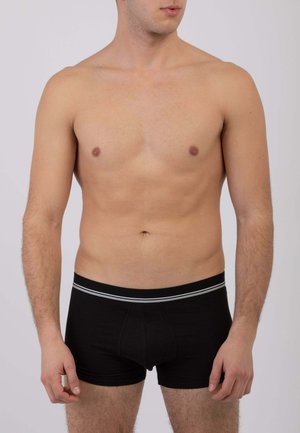 Boxer briefs in cotone nero con fascia elastica grigia a righe, design aderente, texture liscia e senza motivi o loghi visibili.