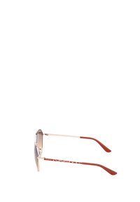 Gafas de sol con lentes marrones en degradado, montura de metal dorado y brazos texturizados rojos con un patrón blanco. Vista lateral que resalta la forma y los detalles.