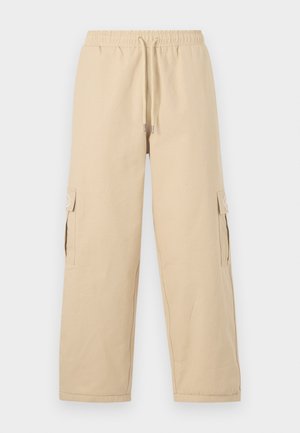 STAMP PANT UNISEX - Cargo trousers - beige