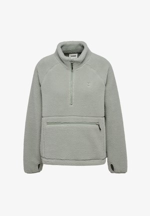Ljusgrå fleecepolo med halvdragkedja, framficka med dragkedja och tumhål vid ärmsluten. Mjuk textur, avslappnad passform och minimal märkning.