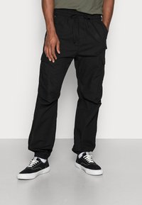 Carhartt WIP - JOGGER COLUMBIA - Cargobroek - black rinsed Miniatuurafbeelding 1