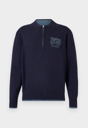 Navy blue long-sleeve pullover with quarter zipper, ribbed cuffs and hem, and light blue "Replay Blue Jeans" logo on left chest.