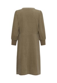 Olive green dress with a relaxed silhouette, rounded neckline, and puffed sleeves. Made of soft fabric with a textured finish.