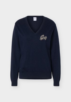 Tumesinine V-kaelusega kampsun pika varrukaga, vasakul rinnal käsitsi tikitud kursiivkirjaga "Golf".