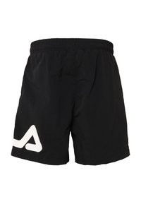 Svarta badshorts med elastisk midja, med en vit geometrisk design på vänster ben. Lätt och mjukt material, ovanför knäet längd.