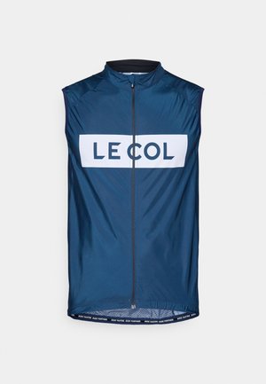 Gilet de cyclisme bleu marine avec un col haut, fermeture éclair sur toute la longueur et un grand logo blanc. Texture légère et lisse, design sans manches.