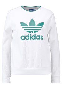 Sweatshirt Adidas blanc en tissu texturé et en maille. Présente un grand logo teal et des rayures sur le devant, un col rond et des manches longues.