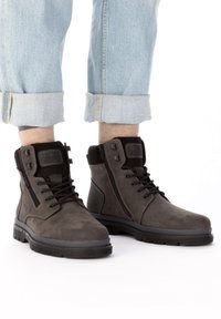 Rieker Bottines à lacets - grau