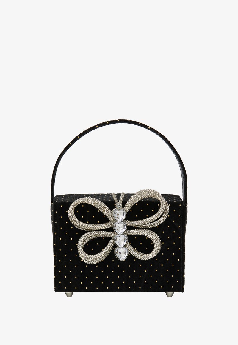 Czarna torebka z weluru z złotymi kropkami, akcent w kształcie kokardy z kryształkami oraz uchwyt na górze. Posiada metalowe nóżki dla stabilności.