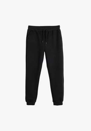 Schwarze Sweatpants aus strukturiertem Stoff, mit elastischem Bund, Kordelzugverschluss und seitlichen Taschen. Am Knöchel taperte Bündchen.