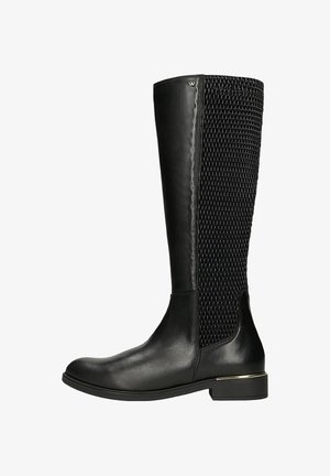 Stivale alto in pelle nera con pannello posteriore in maglia testurizzata, tacco basso con rifinitura dorata e punta rotonda, vista laterale su sfondo bianco.