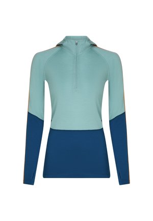 Maglietta atletica a maniche lunghe con mezza zip, bicolore in teal chiaro e blu scuro, con fori per il pollice sui polsini.