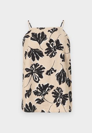 Μπεζ αμάνικη μπλούζα με λεπτές τιράντες, διακοσμημένη με μεγάλο μαύρο λουλουδένιο μοτίβο και διακριτικές λευκές λεπτομέρειες σε μονόχρωμο ανοιχτό φόντο.