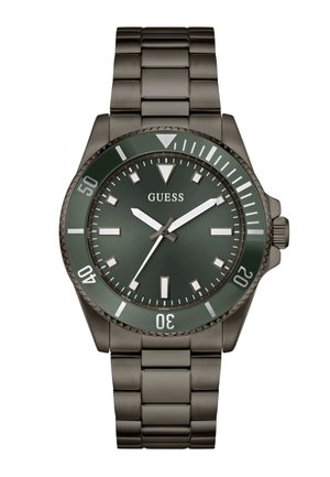 Montre Guess pour homme avec un cadran vert foncé, des index heures en argent, une lunette rotative et un bracelet en acier inoxydable.