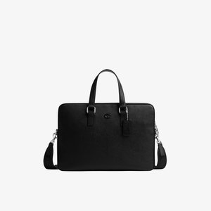 Valigetta in pelle nera con due manici, tracolla staccabile e una piccola targhetta appesa su sfondo bianco.