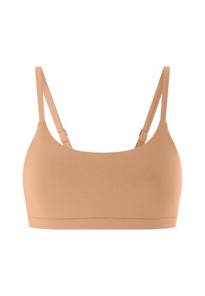Senza cuciture in un tessuto beige chiaro, con spalline regolabili e scollatura quadrata. Morbido al tatto e senza hardware visibile.