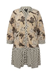 Kukallinen mekko beige- ja mustassa, jossa on kauluskanta, nappi etuosassa ja kontrastivärinen kuosihelma, jossa on laskoksia.