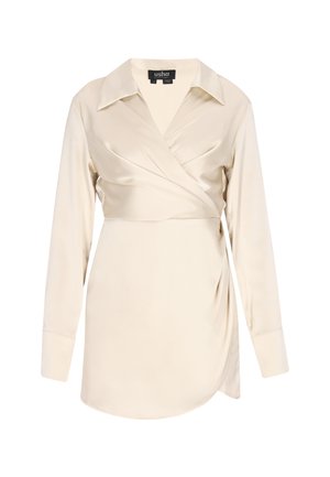 Kermanvärinen, pitkähihainen satiinipusero, jossa on kietaisumallinen etuosa, leveä kaulus ja hienovarainen sivudraperaus, koko pieni, merkkilappu näkyvissä.