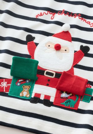 Triibuline kangas, millel on Jõuluvana kujundus tikitud detailidega. Sisaldab rohelisi ja punaseid taskuid tikandiga mänguasjade piltidega.