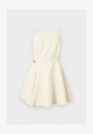 Φόρεμα χωρίς μανίκια σε κρεμ απόχρωση, με λεπτές τιράντες, τετράγωνη λαιμόκοψη, εφαρμοστή μέση με μικρή ζώνη και φουσκωτή φούστα.