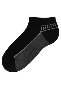 Schwarze Knöchelsocke mit grauem Fersen- und Zehenbereich. Verfügt über ein strukturiertes Streifenmuster in der Nähe des Bündchens. Hergestellt aus einem glatten, dehnbaren Material.