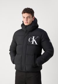Calvin Klein Jeans ESSENTIALS JACKET - Talvejope - black
