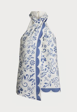 Haut en tissu blanc avec des motifs floraux bleus et un ourlet festonné. Conception à encolure halter avec une fermeture éclair au dos. Texture légère.