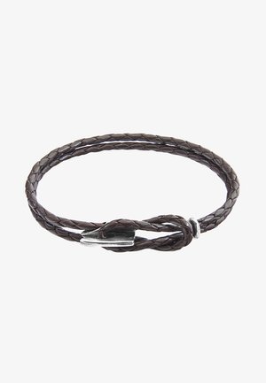 Brown braided leather bracelet with a simple silver metal clasp. Features three intertwined strands and a smooth, textured finish.