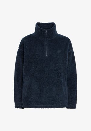 Námořnický modrý fleecový pulovr s vysokým límcem a čtvrtinovým zipem. Má texturovaný, plyšový povrch a volný střih. Jednoduchý design, bez ozdob.