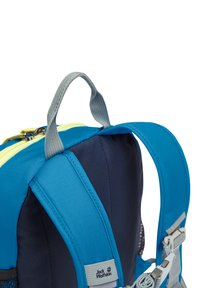 Blue and navy backpack with gray straps and a top handle. Features a yellow zipper and a side mesh pocket. Logo tag visible on strap.
