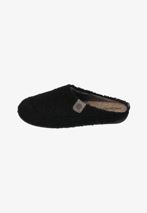 Black slipper made of textured fabric, with a soft lining and a logo tag. The design is open at the heel, featuring a rounded toe.