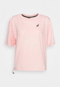 Light pink short-sleeve t-shirt with a round neck, featuring a small dark logo on the left chest and drawstring detail at the hem.