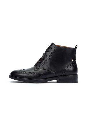 Black leather ankle boots with brogue detailing, lace-up front, rounded toe, and a low block heel. Features a small logo on the side.