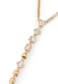 Gold-toned necklace featuring rectangular and diamond-shaped clear crystals with a smooth texture, linked by chain and accent beads.