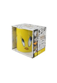 Mug in ceramica con un esterno giallo brillante raffigurante il volto di un personaggio dei cartoni animati. Scatola compatta decorata con motivi e branding dei Looney Tunes.