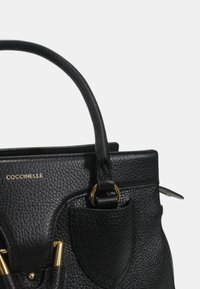Coccinelle Handtas - black
